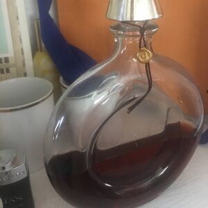 Vintage Guerlain oil perfume large bottle almost half filled.